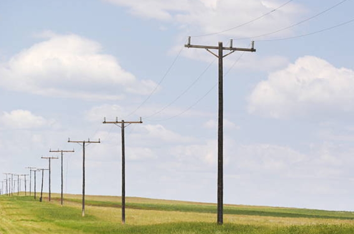 Stack of Six Telephone Poles